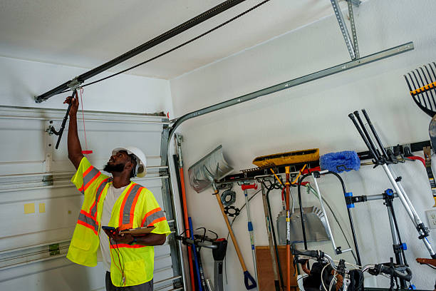Professional Garage Door Panel Replacement technician working in Tahlequah, OK