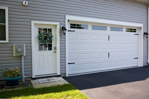 24/7 Emergency Garage Door Panel Replacement experts in Tahlequah, OK